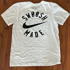 Nike swoosh made black and white T-shirt size S